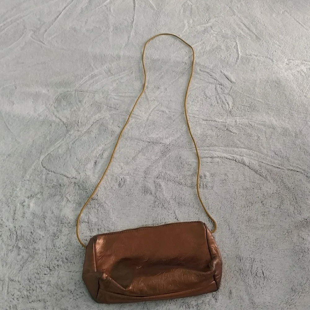 Small bronze embossed evening bag
